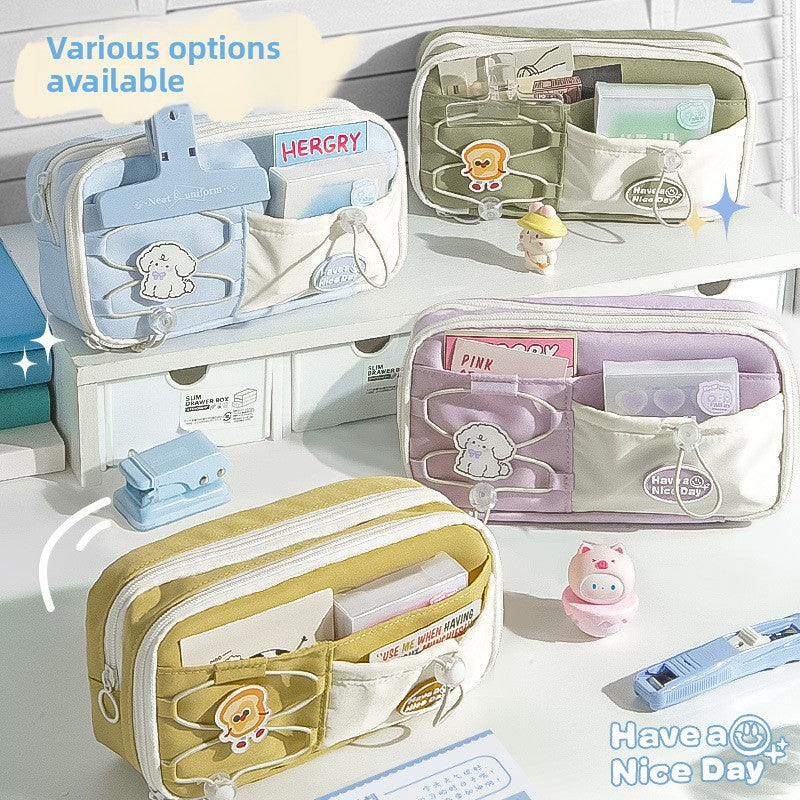 Large capacity stationery pencil cases in Sea Salt Blue, Cheese Yellow, and Taro Purple shown together