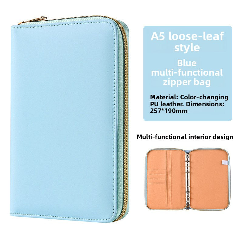 Blue A5 PU leather zip-around notebook organiser with product details and an interior view
