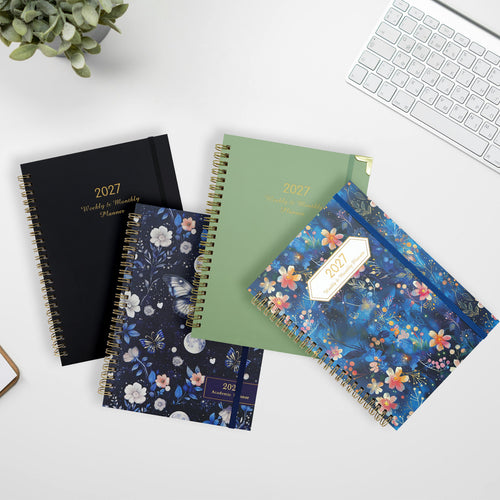 Selection of 2027 A5 spiral weekly and monthly planners with patterned, green and black covers