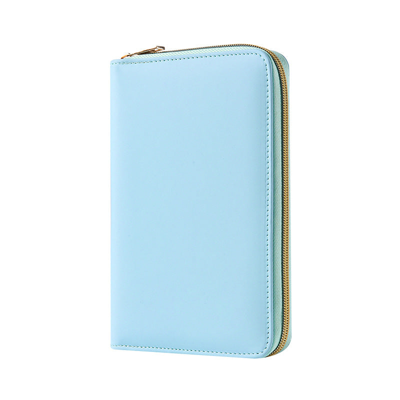Closed light blue A5 PU leather zip-around notebook organiser on a white background