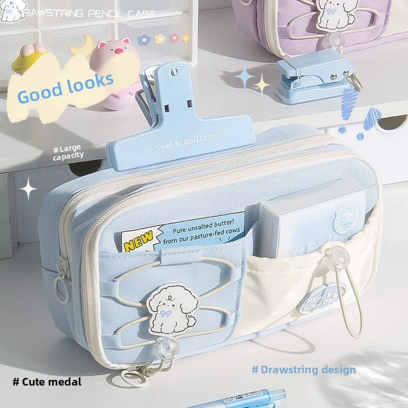 Sea Salt Blue large capacity pencil case with pastel decorations, multiple zip compartments and pencil storage