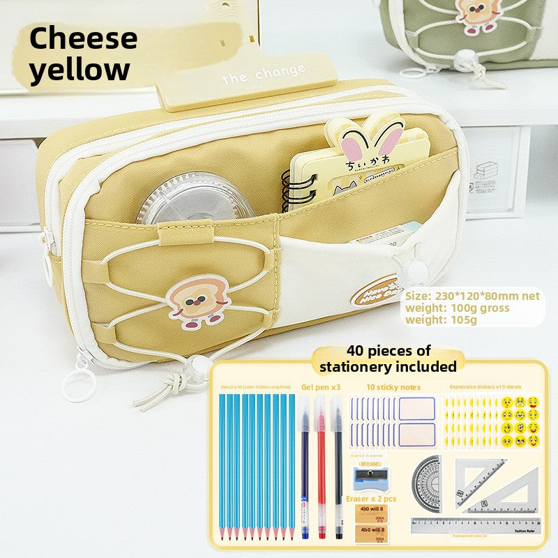 Cheese Yellow pencil case open with pastel stationery, with graphic showing included 40-piece stationery set